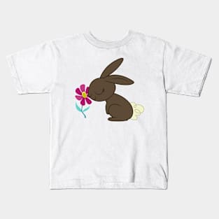 Bunny smelling a flower Kids T-Shirt